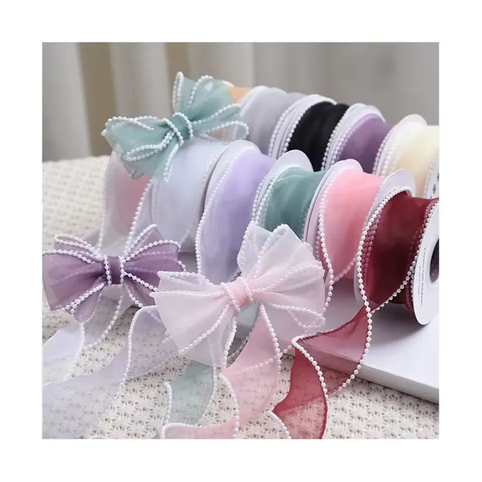 Shop premium organza ribbon with beads and wavy edges for all your wedding and party decorations. Find the best deals at Qasimstationers.pk today!