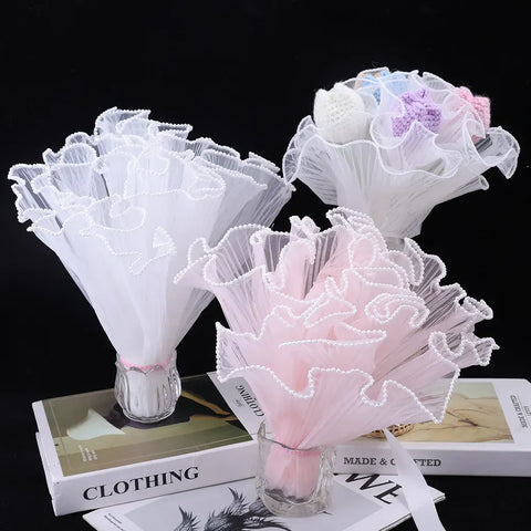 Shop our premium flower wrapping cloth, crafted from chemical fiber. Choose from white, black, or champagne pink to beautifully showcase your floral creations.
